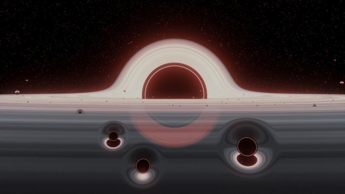 Around a monster black hole, smaller black holes collide in strange ways_622922e821fe8.png