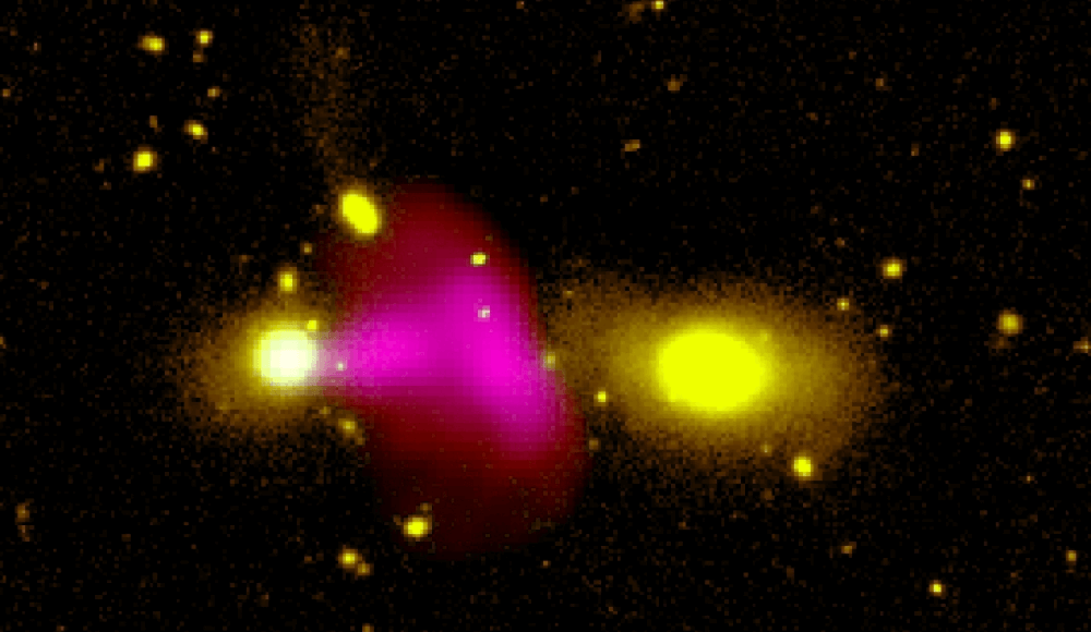 Bizarre black hole is blasting a jet of plasma right at a neighboring galaxy_634c00fd67e7f.png