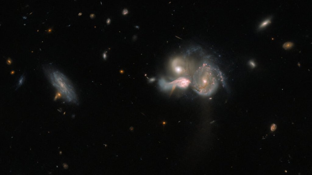 Hubble catches rare crash of three brilliant galaxies_63eb8a1fb711a.jpeg