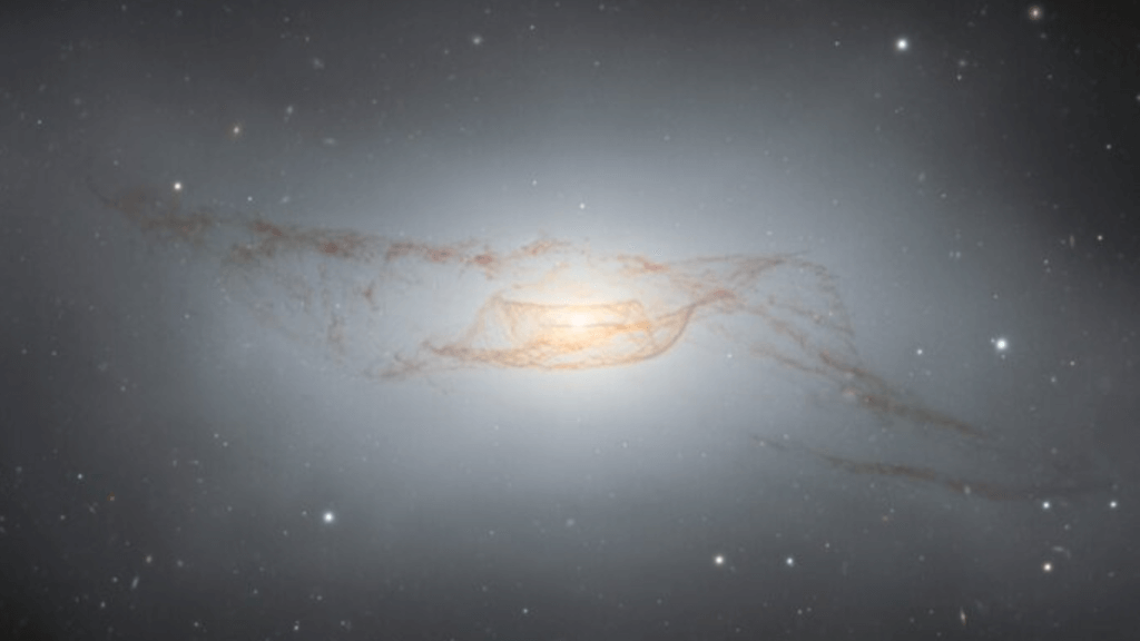 ‘Trainwreck’ galaxy reflects the aftermath of a violent galactic collision (image)_65b51ecedf12f.png
