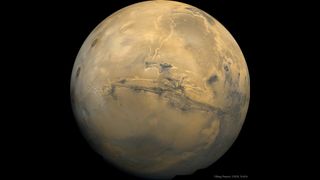 A huge canyon can be seen on the face of Mars. Mosaic of the Valles Marineris hemisphere of Mars composed of 102 Viking Orbiter images of this huge feature on the Red Planet.