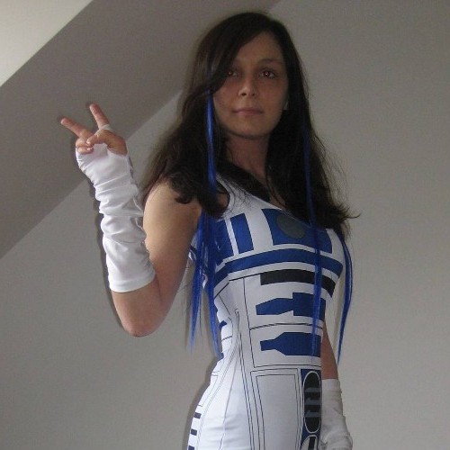Author pofile image of Christina Hughes for Space.com. Long dark hair, wearing and R2-D2 dress.