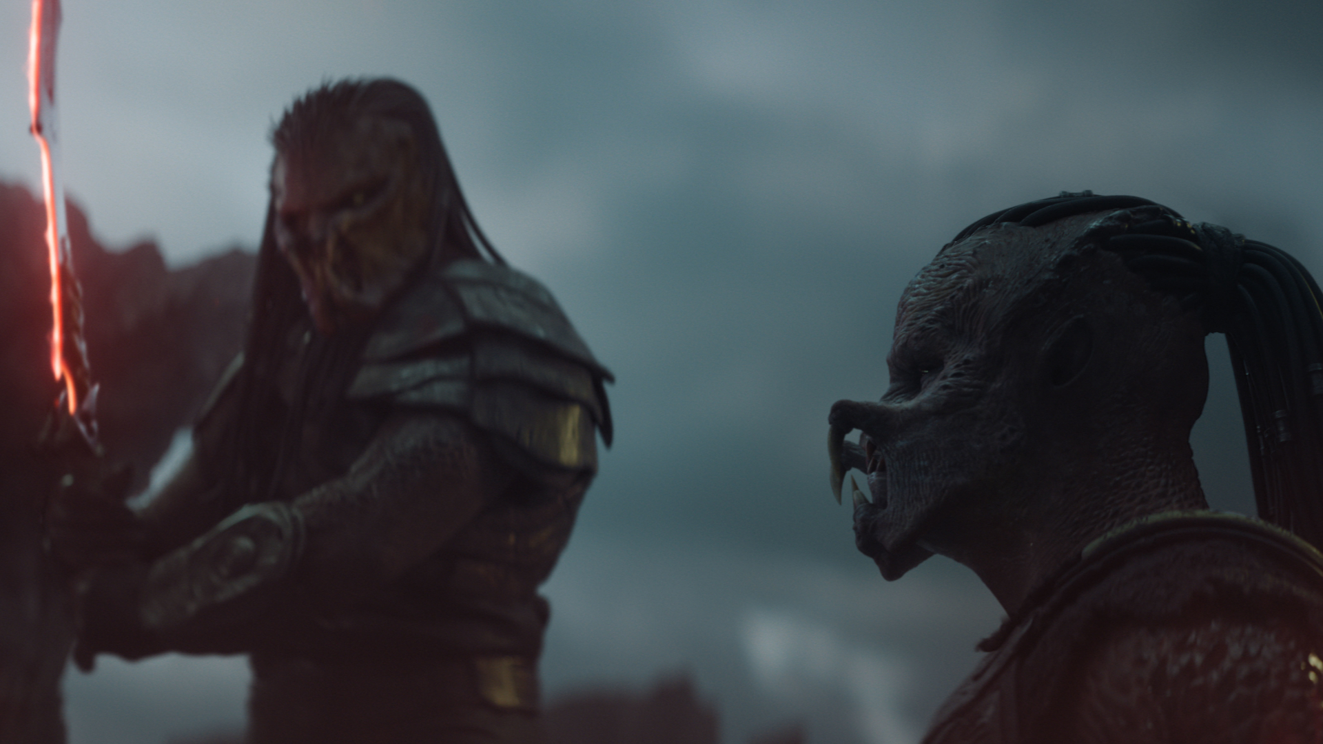 (L-R) Kwei (Mike Homik) and Dek (Dimitrius Schuster-Koloamatangi) in 20th Century Studios' PREDATOR: BADLANDS film. Photo courtesy of 20th Century Studios. © 2025 20th Century Studios. All Rights Reserved.