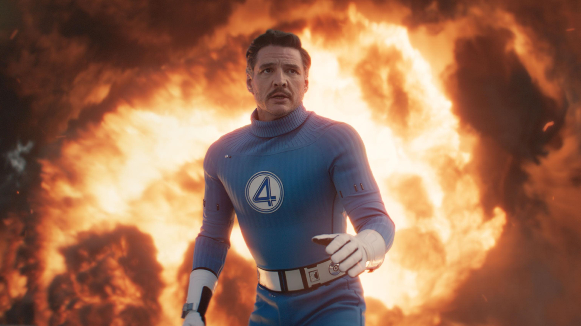 Reed Richards (Pedro Pascal) in The Fantastic Four: First Steps, stood in front of an explosion.