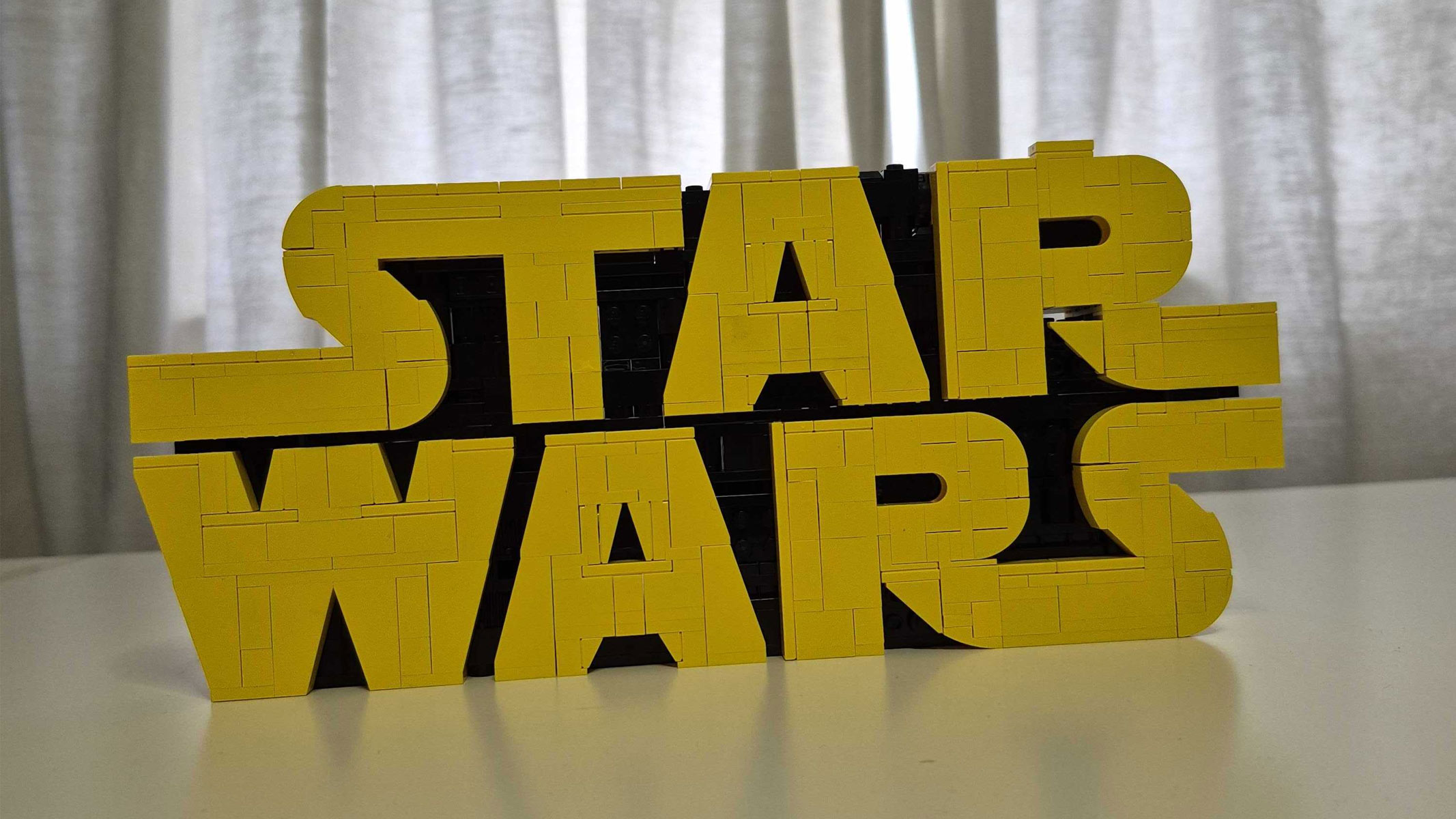 The Star Wars logo, which is the word 