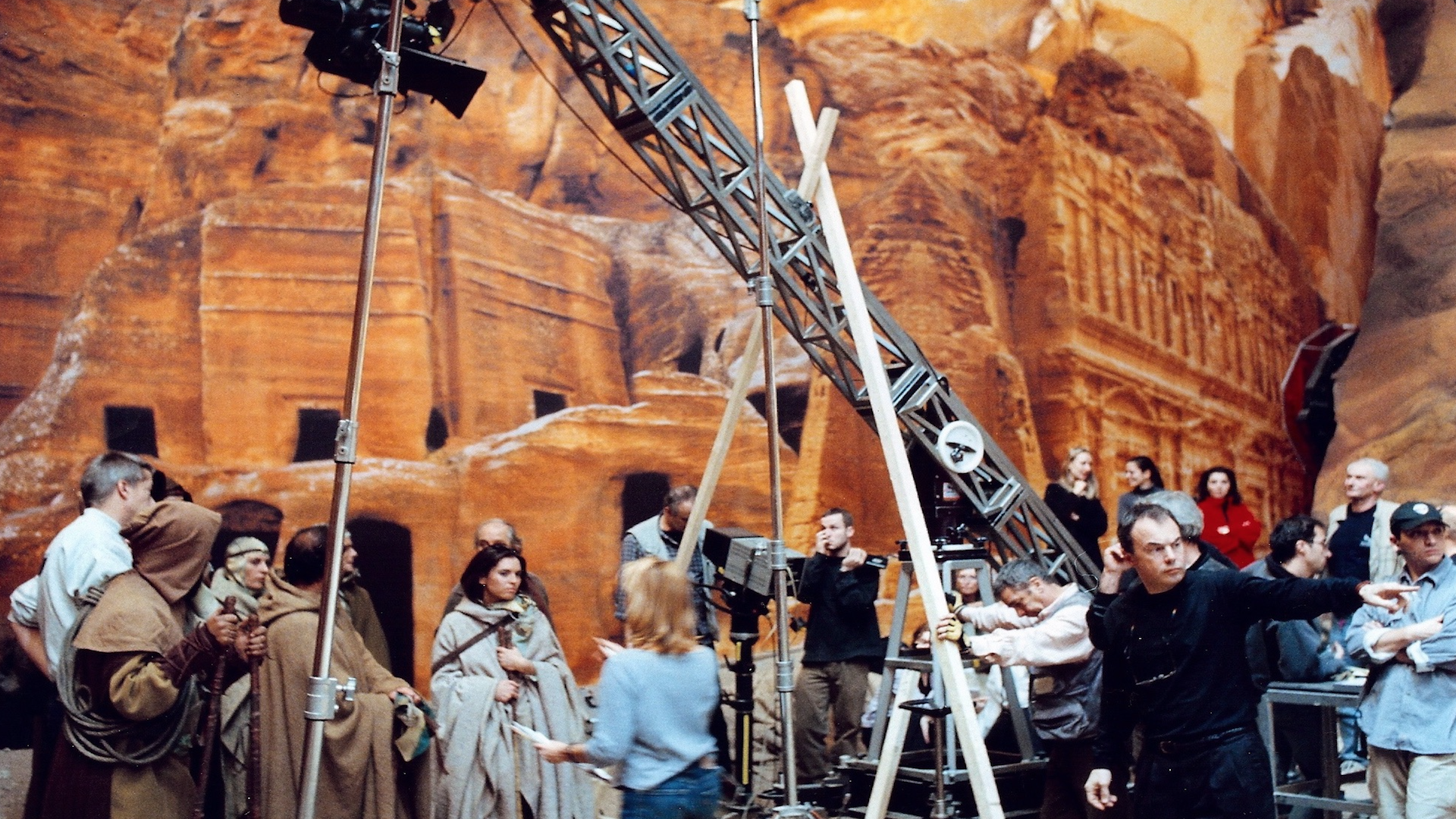 a director filming on a sci-fi desert film set