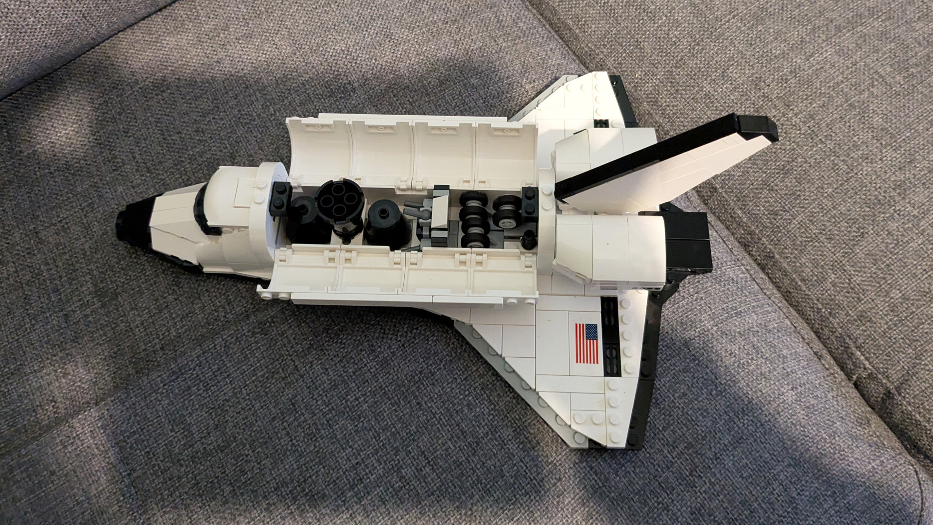 A top down view of the Lego Icons Shuttle Aircraft Carrier Shuttle, with the bay doors open. 