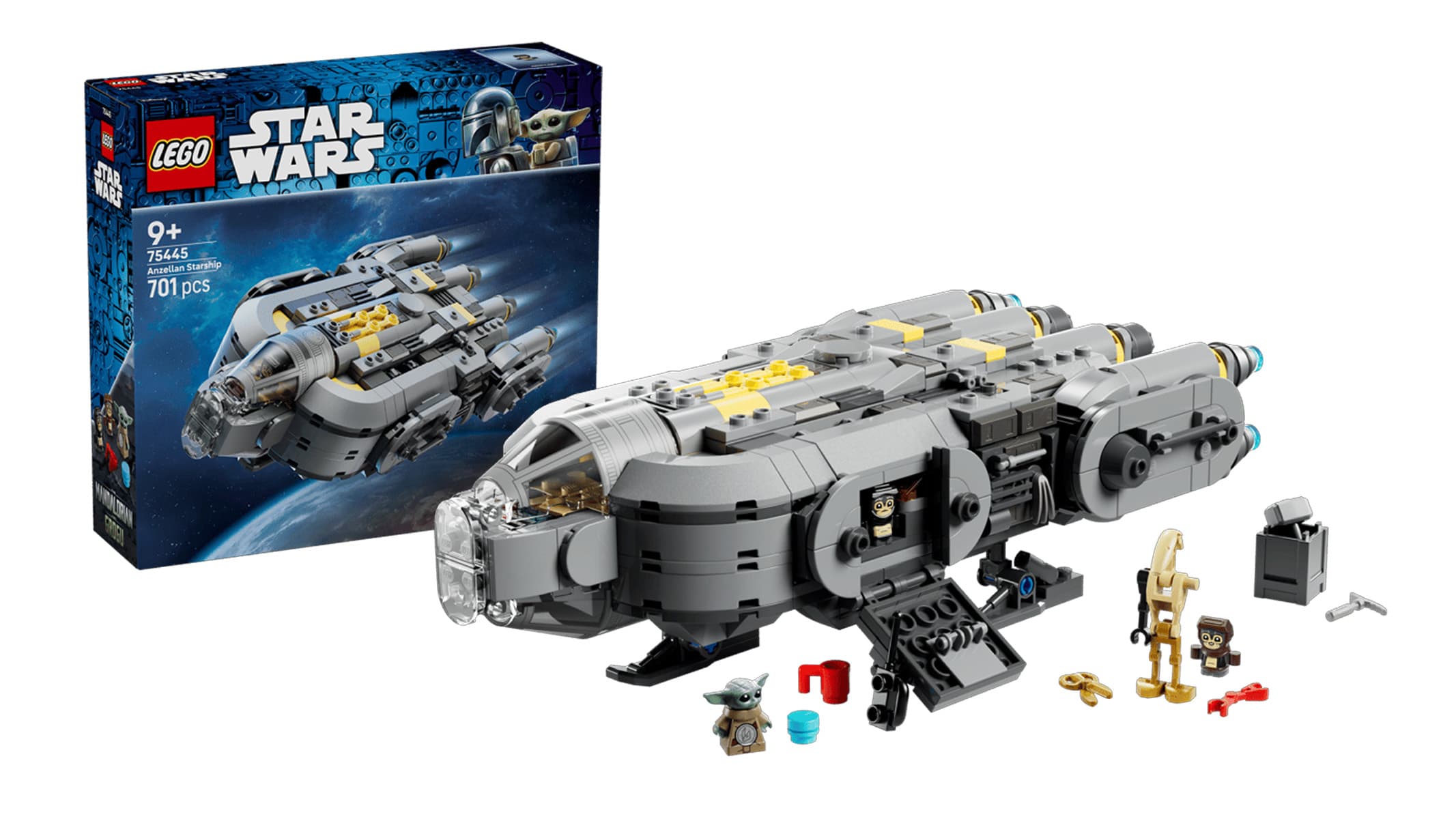 A gray brick-built spaceship, with a touch of yellow, is displayed next to its product box, along with a couple of minifigures, on a white background.