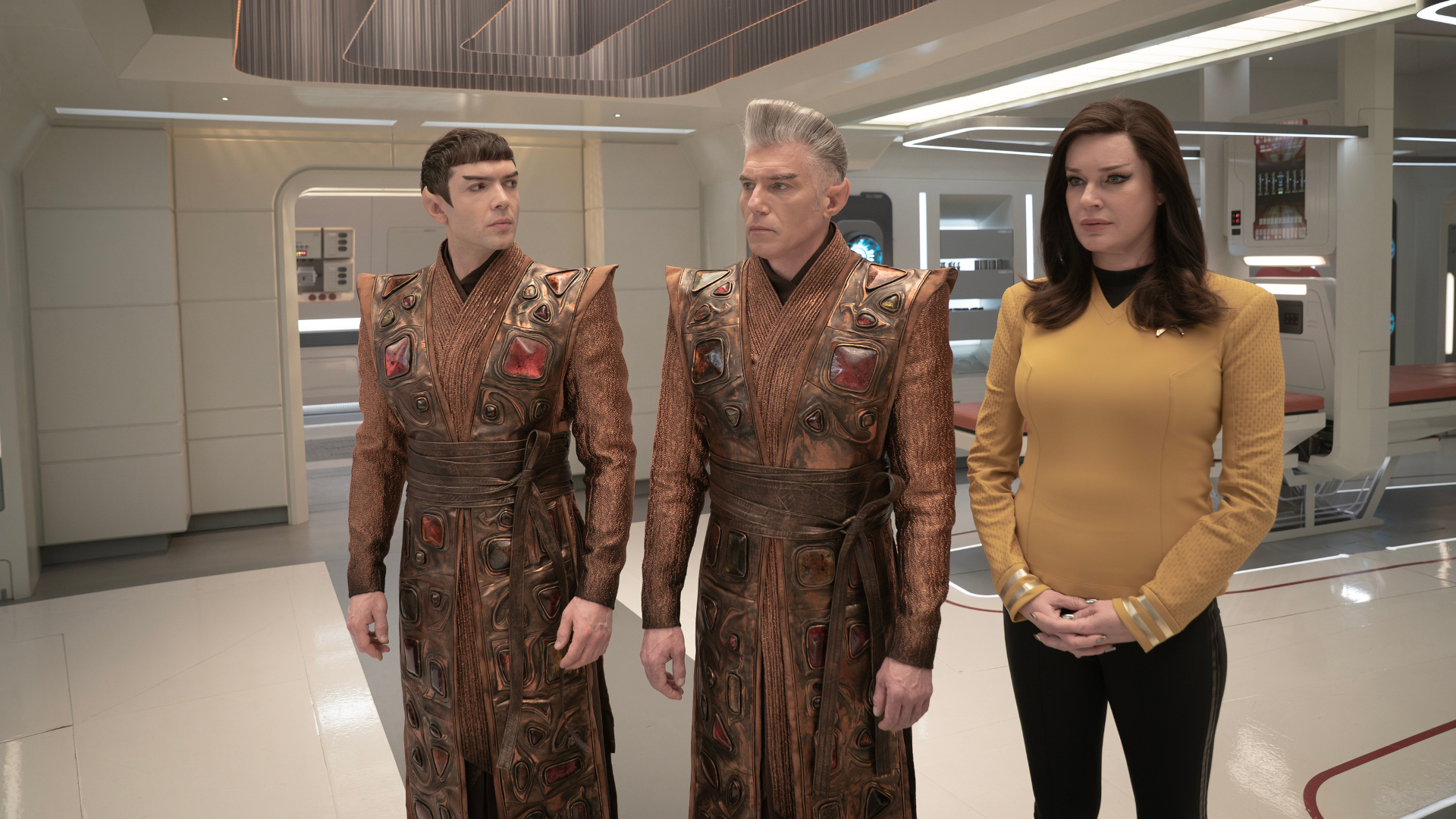 L to R Ethan Peck as Spock, Anson Mount as Capt. Pike and Rebecca Romijn as Una in season 3 , Episode 8 of Strange New Worlds streaming on Paramount+. Photo Credit: Marni GrossmanParamount+