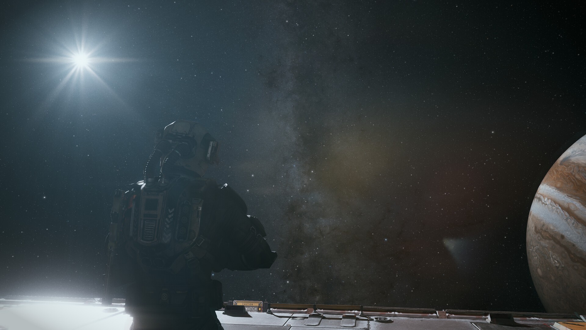 Screenshot from the sci-fi video game The Expanse: Osiris Reborn. It shows the player character in a spacesuit during a spacewalk, looking into the void, with Jupiter visible nearby.