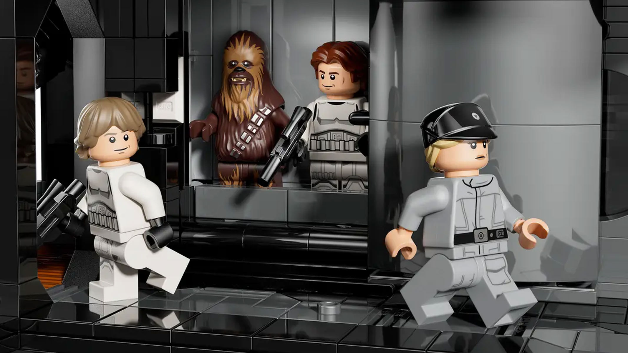 Chewbacca and Leia minifigures stand in a brick-built elevator while two other minifigures are walking away from each other.