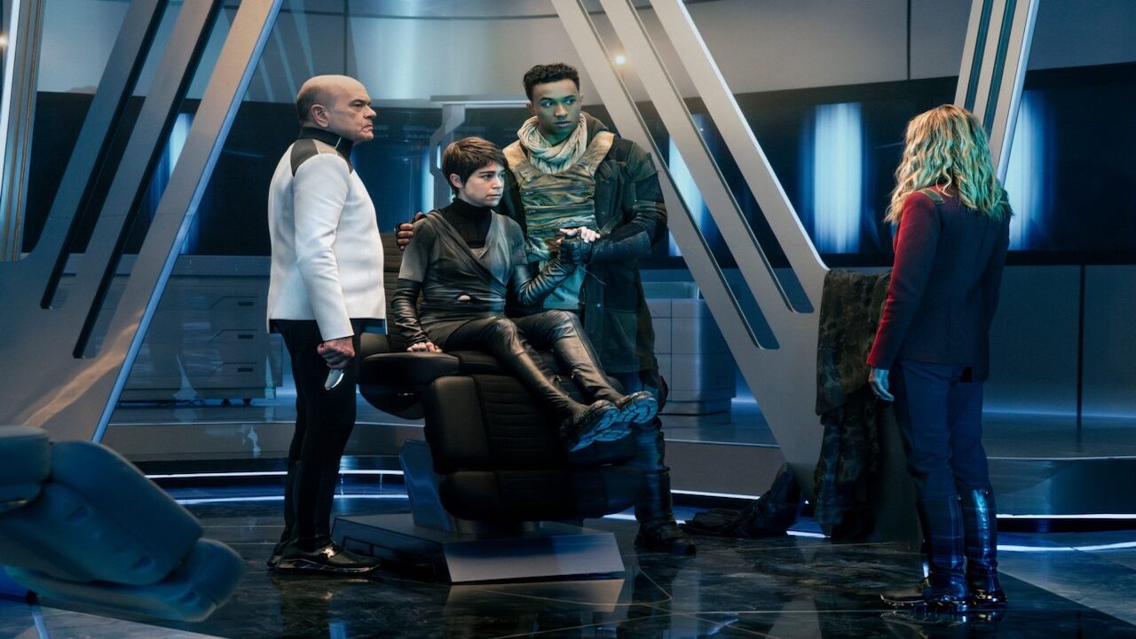 four characters in a sci-fi tv show on a spaceship