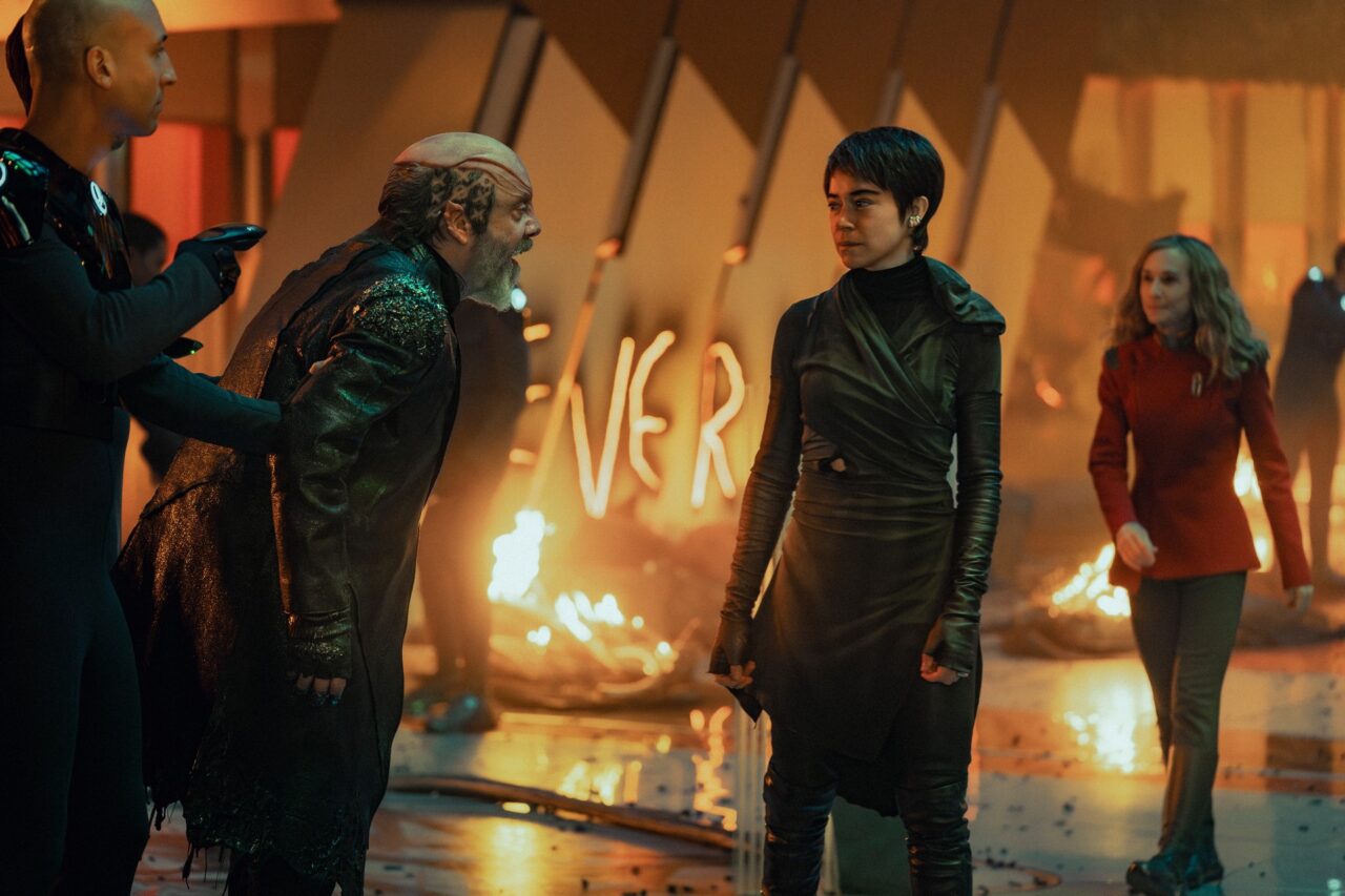 an alien villain confronts a human woman