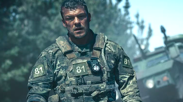 ‘War Machine’s’ Alan Ritchson and director Patrick Hughes on why they filmed the action flick ‘like a horror movie’ (interview)_69b0c87f172aa.png