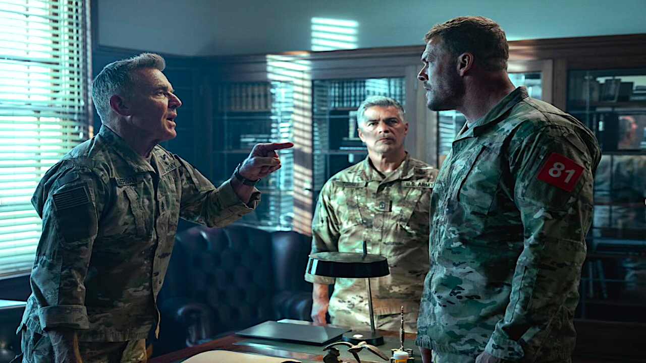three military men having an argument in an office