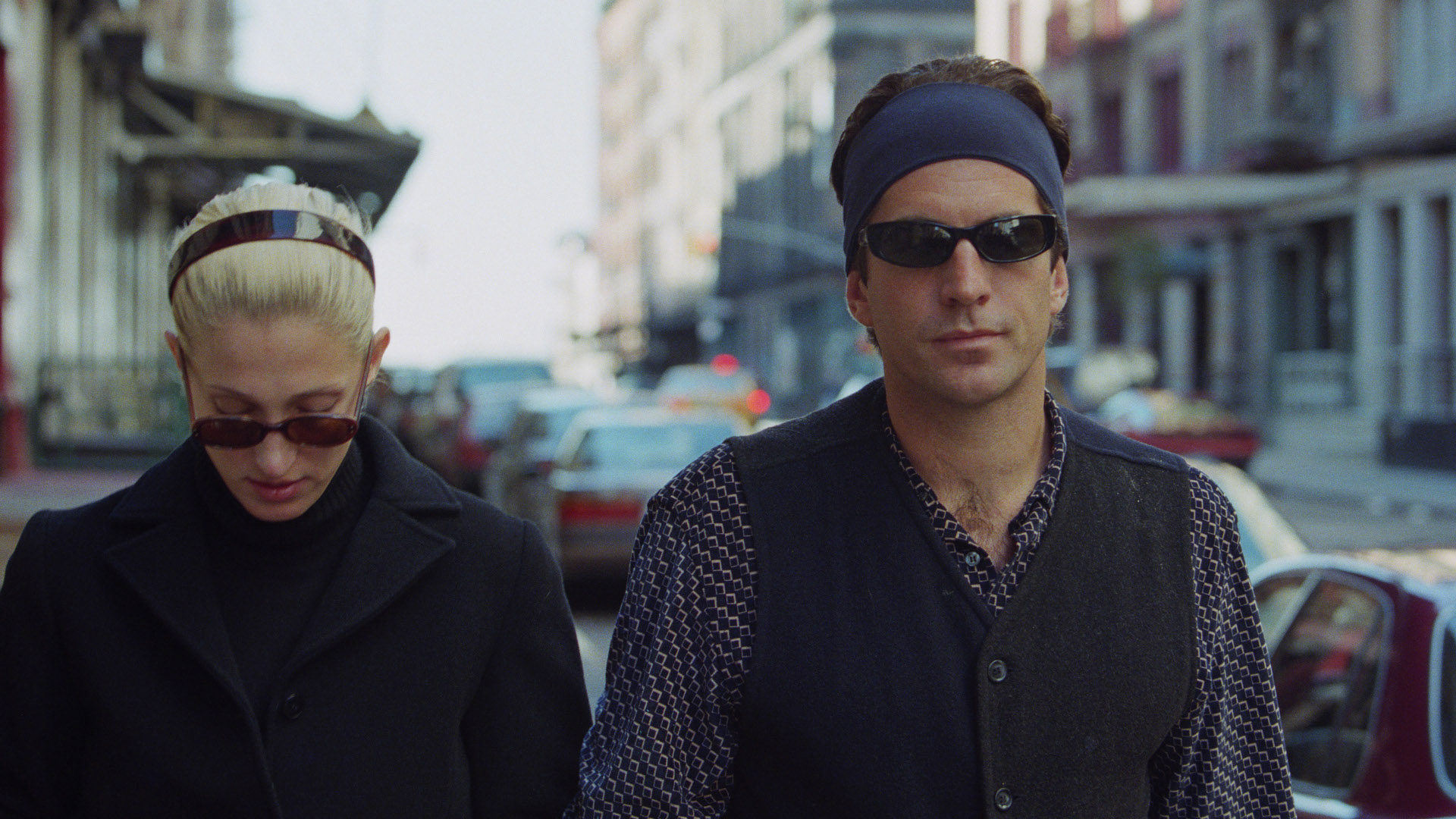 John Kennedy, Jr. and his wife, Carolyn Bessette-Kennedy stroll together near their TriBeCa loft (18 October, 1997)