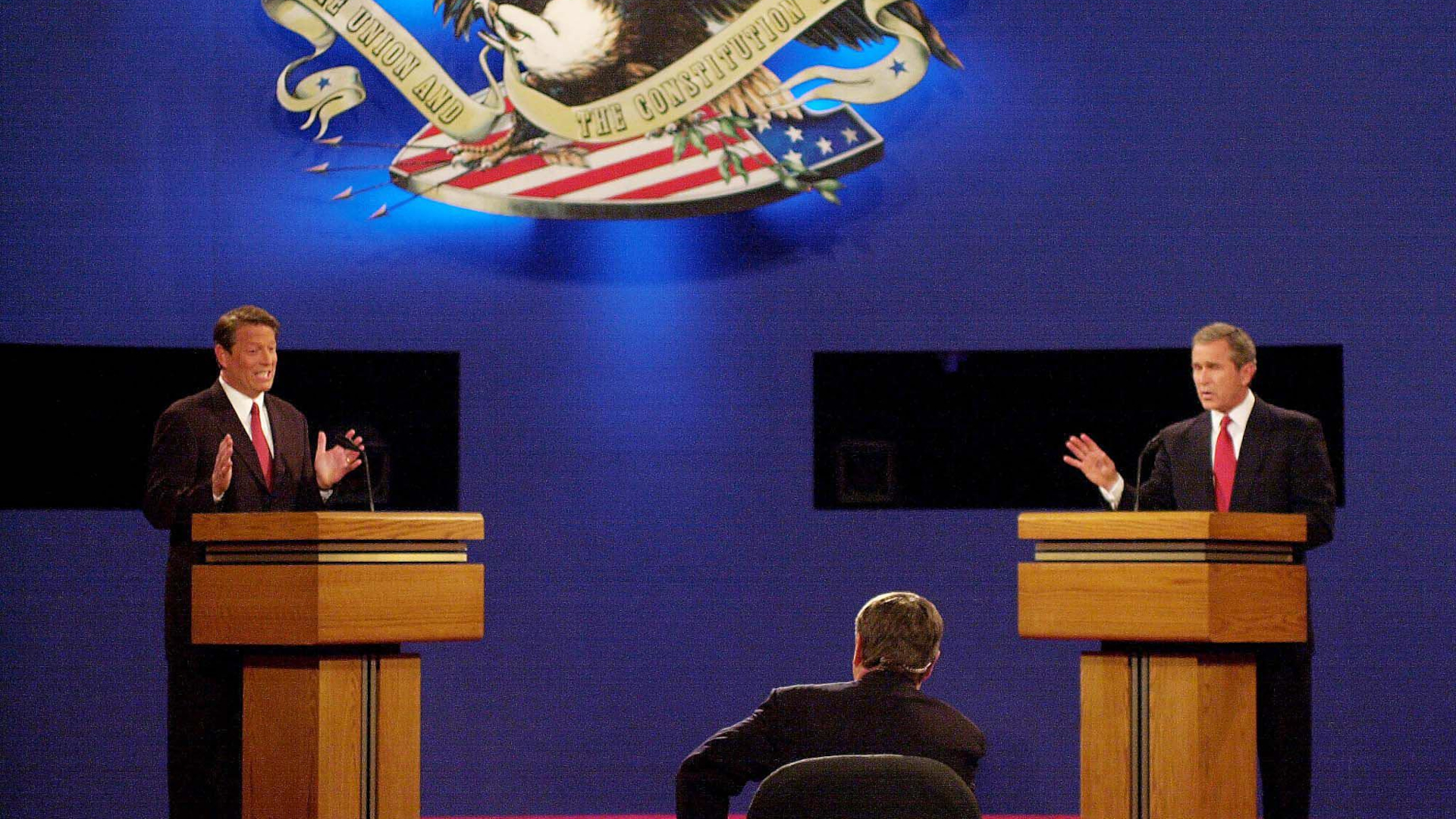 Republican presidential candidate George W. Bush (R) and Democratic presidential candidate Al Gore debate 03 October, 2000, at the University of Massachusetts-Boston.