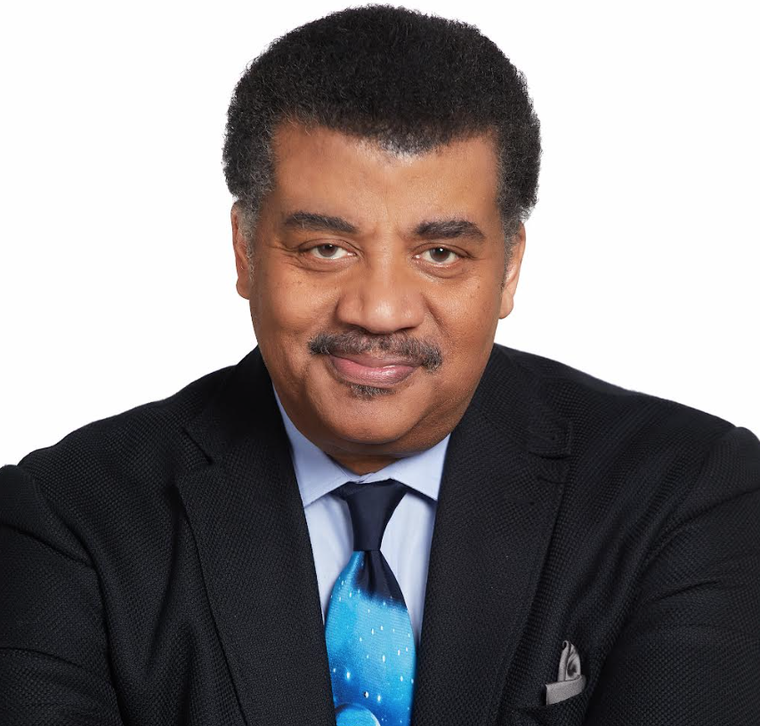 a portrait image of a man wearing a suit
